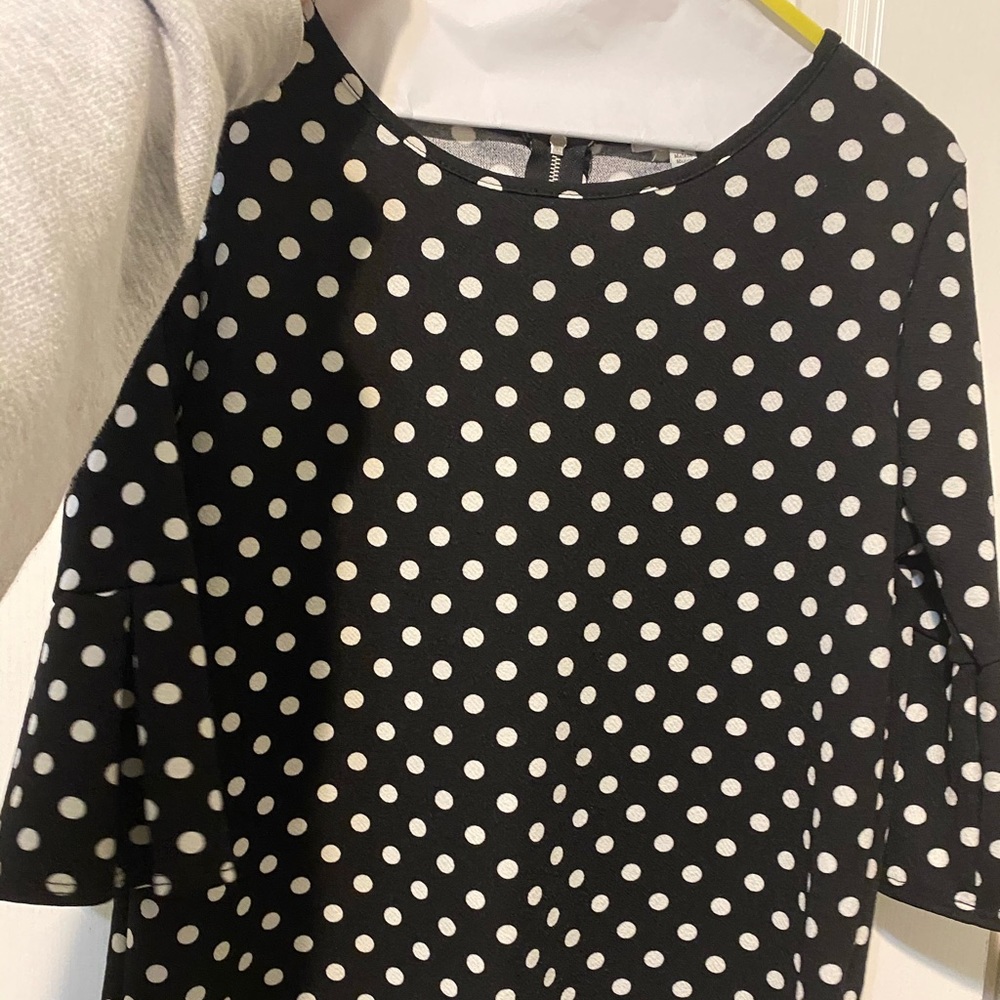 Polka dot top with peplum sleeves